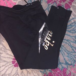 Black Nike cuffed sweat pants